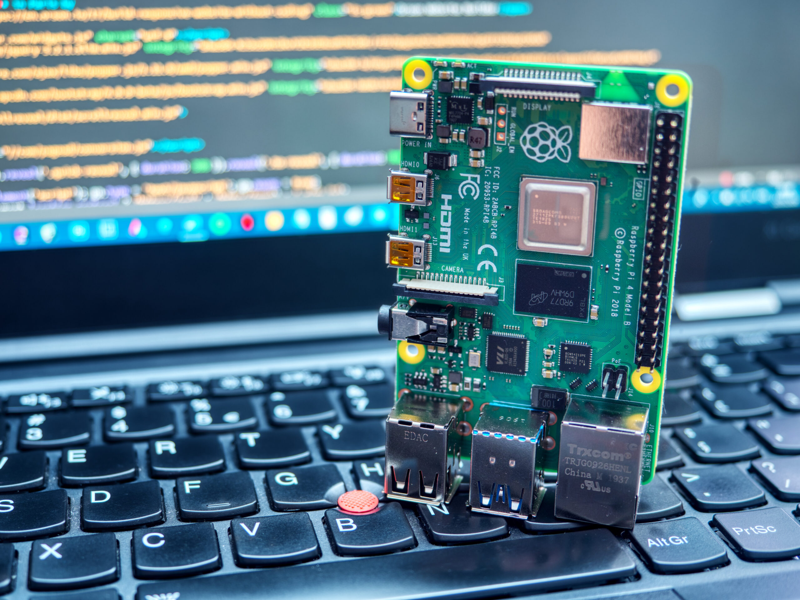 Galati, ROMANIA - March 22, 2020: Close-up of a Raspberry Pi 4 Model-B on a laptop keyboard. The Raspberry Pi is a credit-card-sized single-board computer developed in the UK